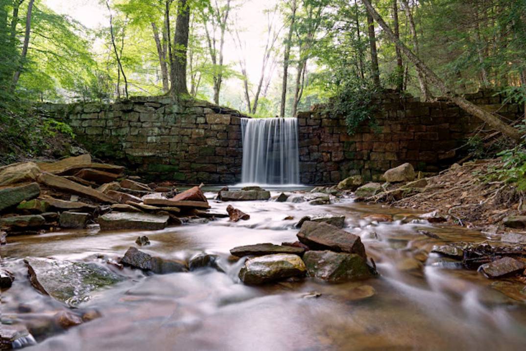 Henry Run Sawmill Dam Falls Flowing Over The Historic Logging Dam In Cook Forest State Park